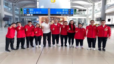 Down Judo Milli Takımımız ve teknik ekip birlikte poz veriyor.